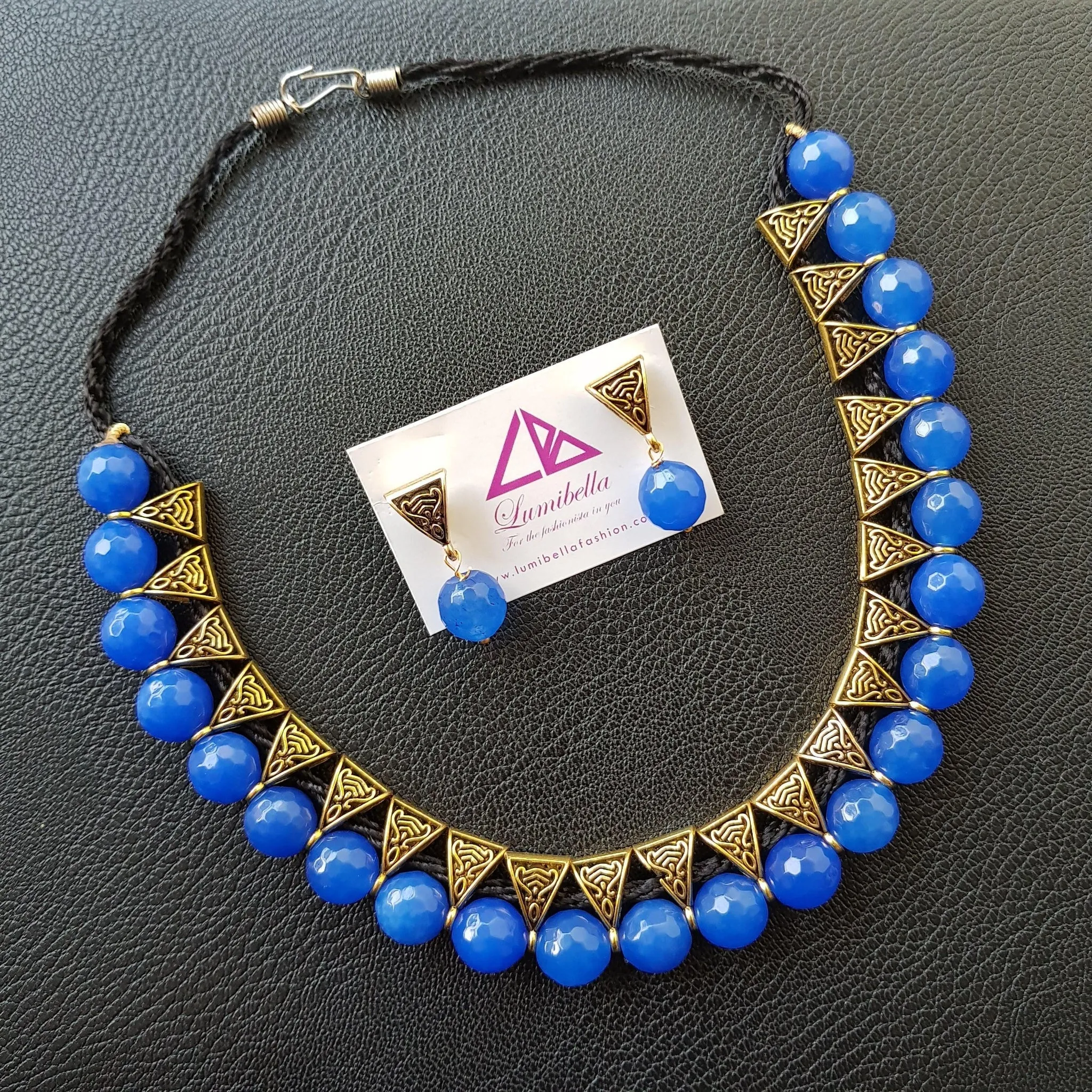 Agade beads with golden colour embellishment