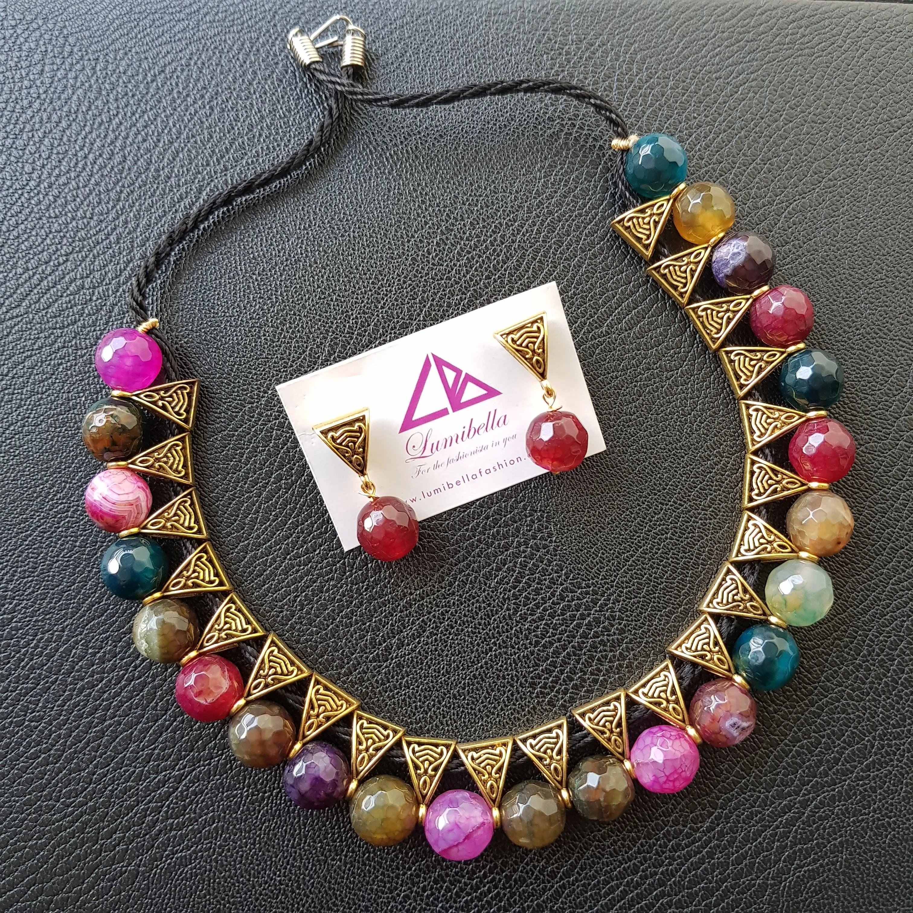 Agade beads with golden colour embellishment